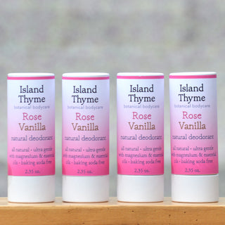 Four Rose Vanilla Deodorant tubes are lined up, displaying pink and white labels. This all-natural, ultra gentle deodorant is baking soda free and comes in a biodegradable tube.