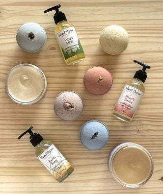 Products evocative of spa day - massage oil and bath bombs