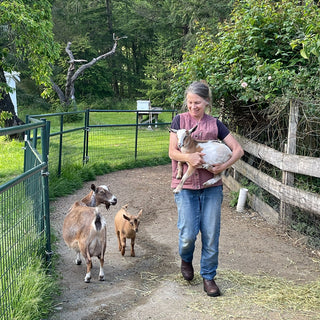Woman with goats